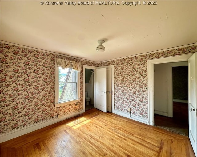 5430 Virginia Ave SE, Charleston, WV 25304 - unfurnished room featuring wallpapered walls and light wood-type flooring