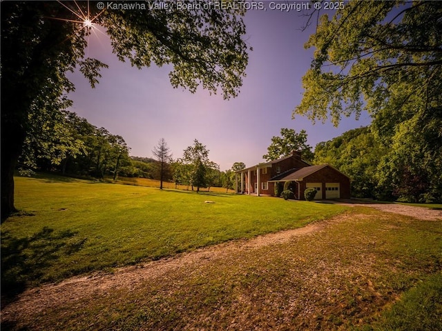 1846 Scott Depot Rd, Scott Depot, WV 25560 - view of green lawn with an attached garage and driveway