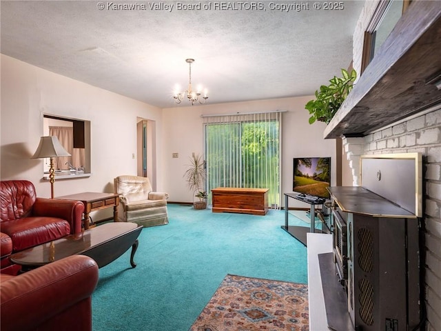1846 Scott Depot Rd, Scott Depot, WV 25560 - carpeted living area featuring a chandelier and a textured ceiling
