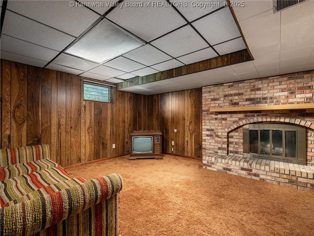 1846 Scott Depot Rd, Scott Depot, WV 25560 - sitting room with carpet floors, a brick fireplace, wooden walls, and a paneled ceiling