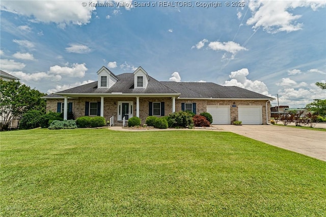 1155 Pike St, Milton, WV 25541 - cape cod-style house with an attached garage, concrete driveway, a front lawn, and brick siding