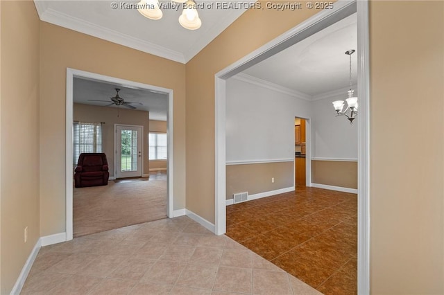 1155 Pike St, Milton, WV 25541 - hall with a chandelier, ornamental molding, tile patterned flooring, and carpet