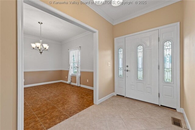 1155 Pike St, Milton, WV 25541 - foyer featuring ornamental molding, tile patterned floors, and a chandelier