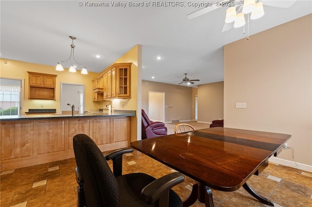 1155 Pike St, Milton, WV 25541 - dining room featuring a ceiling fan, recessed lighting, and stone finish floors