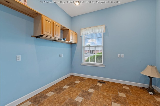 1155 Pike St, Milton, WV 25541 - washroom with baseboards and dark stone finish floors