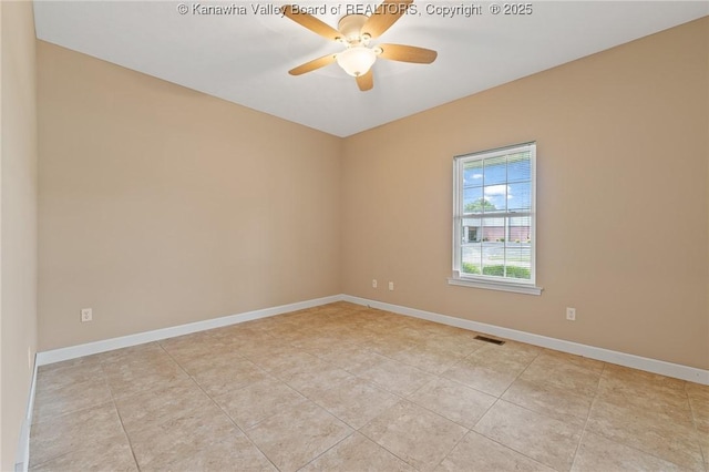 1155 Pike St, Milton, WV 25541 - empty room with a ceiling fan and light tile patterned floors
