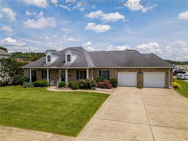 1155 Pike St, Milton, WV 25541 - cape cod-style house with a front lawn, a garage, brick siding, concrete driveway, and a shingled roof