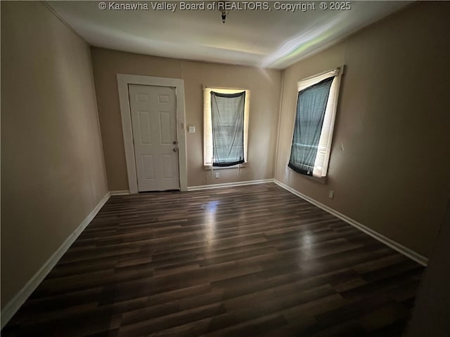 7001/2 Buffington St, Huntington, WV 25702 - foyer entrance with dark wood-type flooring and baseboards