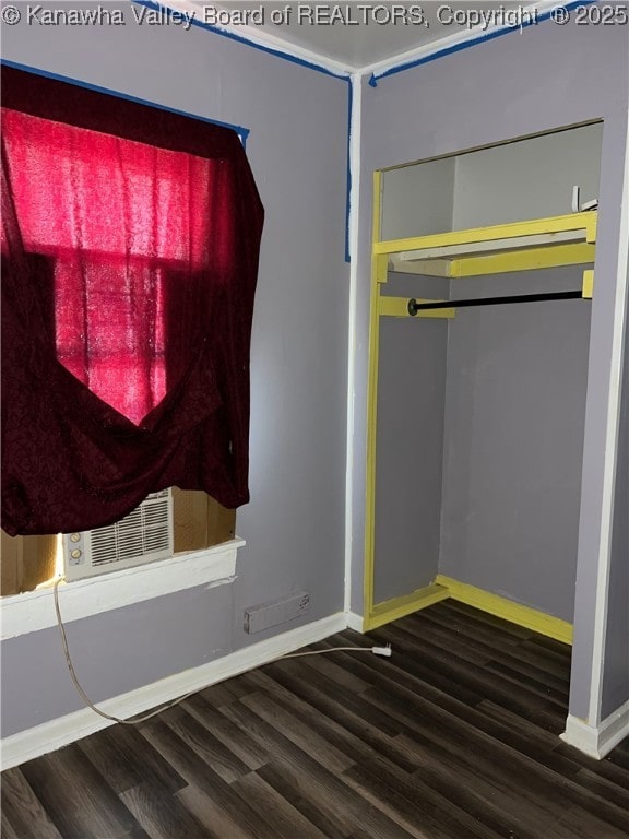 7001/2 Buffington St, Huntington, WV 25702 - unfurnished bedroom featuring wood finished floors and a closet