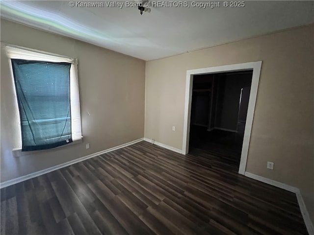 7001/2 Buffington St, Huntington, WV 25702 - spare room featuring wood finished floors and baseboards
