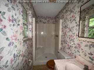 873 Woods Dr, Saint Albans, WV 25177 - full bath with wallpapered walls, vanity, and a shower