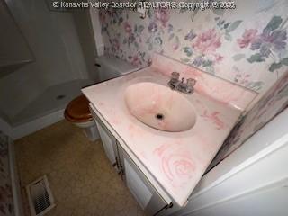 873 Woods Dr, Saint Albans, WV 25177 - bathroom featuring a shower stall and vanity
