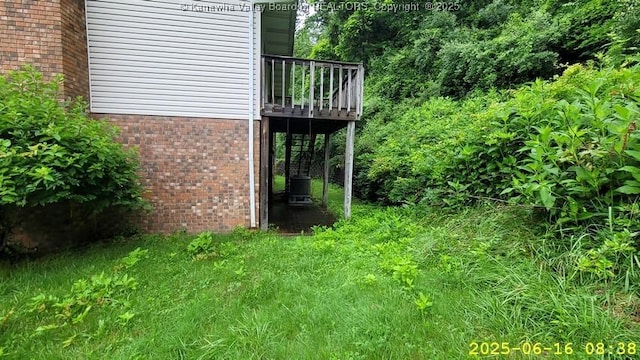873 Woods Dr, Saint Albans, WV 25177 - exterior view of brick siding and a central AC unit