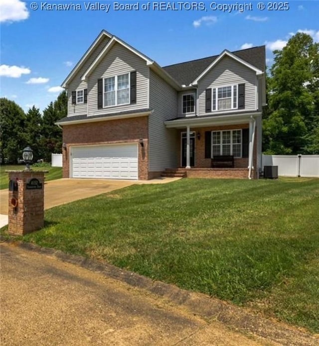 4052 Farmington Dr, Hurricane, WV 25526 - traditional-style house with an attached garage, brick siding, covered porch, and concrete driveway
