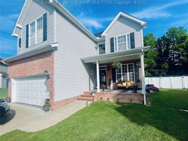 4052 Farmington Dr, Hurricane, WV 25526 - traditional-style home with brick siding, an attached garage, a porch, and outdoor lounge area