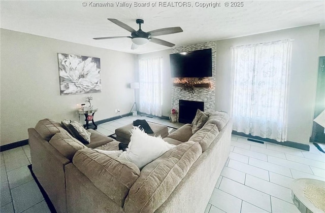 4052 Farmington Dr, Hurricane, WV 25526 - tiled living area with a fireplace and ceiling fan
