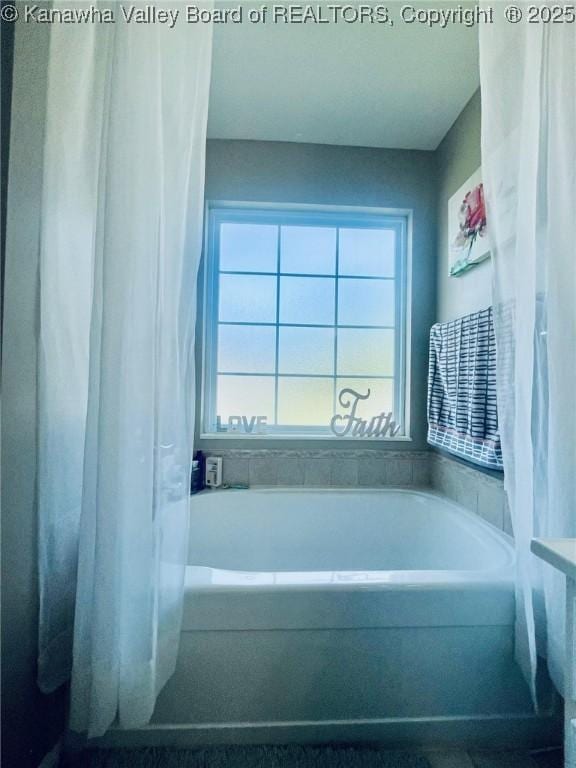 4052 Farmington Dr, Hurricane, WV 25526 - bathroom featuring a garden tub