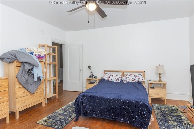 1212 10th St, Huntington, WV 25701 - bedroom with wood finished floors and a ceiling fan