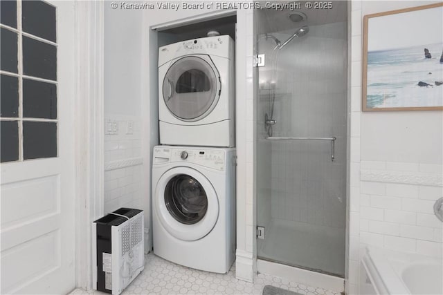1212 10th St, Huntington, WV 25701 - washroom with stacked washing machine and dryer and tile walls
