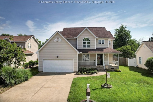 18 Long St, Winfield, WV 25213 - traditional home featuring driveway, a porch, and a garage