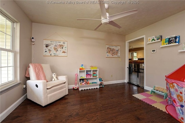 18 Long St, Winfield, WV 25213 - game room featuring wood finished floors, ceiling fan, and a textured ceiling