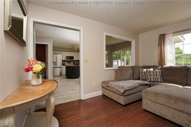 18 Long St, Winfield, WV 25213 - living room featuring light wood finished floors and healthy amount of natural light
