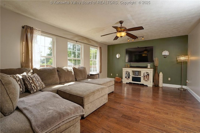 18 Long St, Winfield, WV 25213 - living room with wood finished floors, ceiling fan, and a textured ceiling