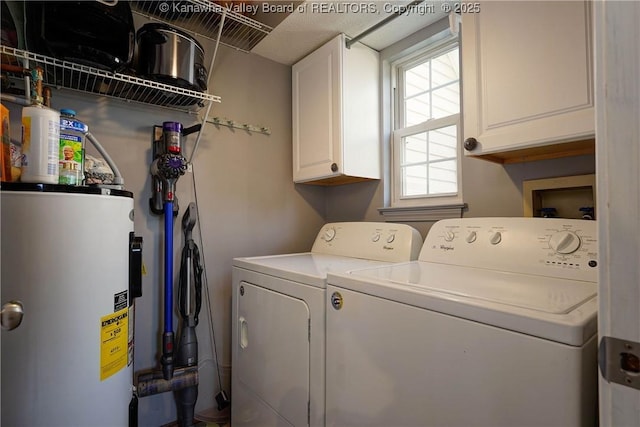 18 Long St, Winfield, WV 25213 - laundry room featuring water heater, cabinet space, and washing machine and clothes dryer