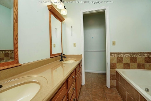 18 Long St, Winfield, WV 25213 - bathroom with double vanity, tiled bath, and tile patterned flooring