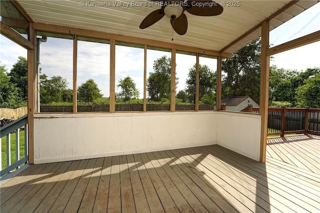 18 Long St, Winfield, WV 25213 - wooden terrace featuring ceiling fan, a fenced backyard, and view of wooded area
