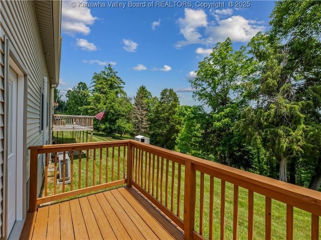 1437 Statts Mills Rd, Ripley, WV 25271 - wooden terrace featuring a yard and view of scattered trees