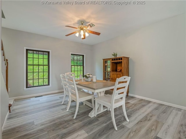 1437 Statts Mills Rd, Ripley, WV 25271 - dining area featuring light wood-style flooring and ceiling fan