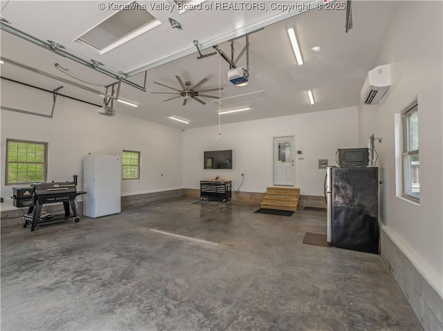 1437 Statts Mills Rd, Ripley, WV 25271 - garage with a garage door opener, an AC wall unit, and freestanding refrigerator