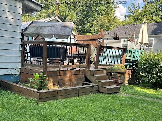 105 Franklin Ave, Saint Albans, WV 25177 - wooden deck with a lawn