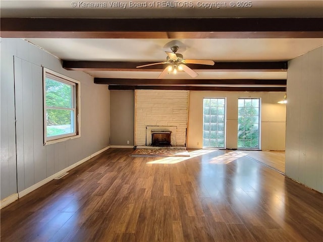 807 Honeysuckle Rd, Elkview, WV 25071 - unfurnished living room featuring beam ceiling, wood finished floors, a brick fireplace, and ceiling fan