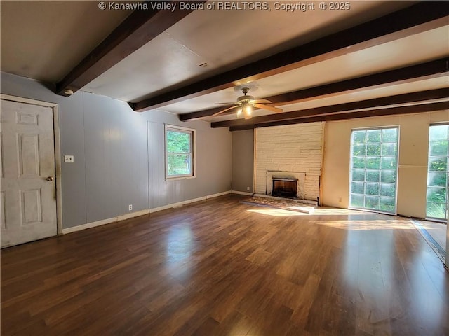 807 Honeysuckle Rd, Elkview, WV 25071 - unfurnished living room with beamed ceiling, wood finished floors, a fireplace, and a ceiling fan