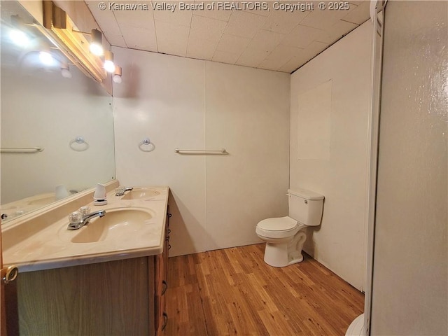 807 Honeysuckle Rd, Elkview, WV 25071 - bathroom with vanity and wood finished floors
