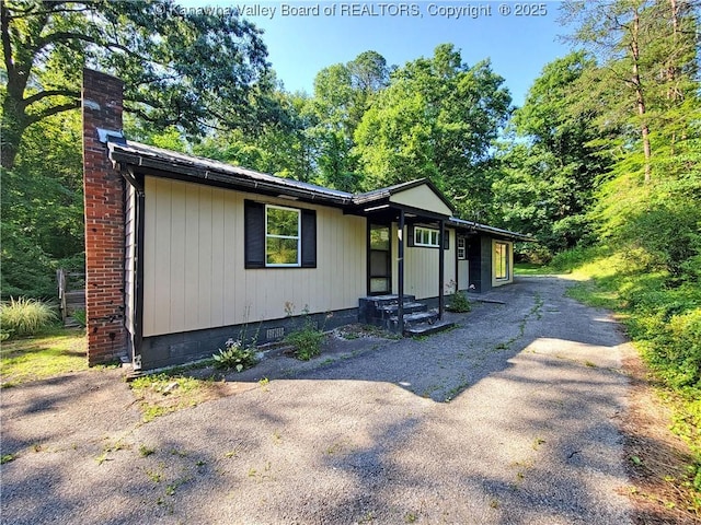 807 Honeysuckle Rd, Elkview, WV 25071 - view of front of house with a chimney, crawl space, and driveway
