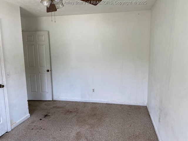 134 Ferguson Ct, Huntington, WV 25701 - carpeted spare room featuring baseboards and a ceiling fan