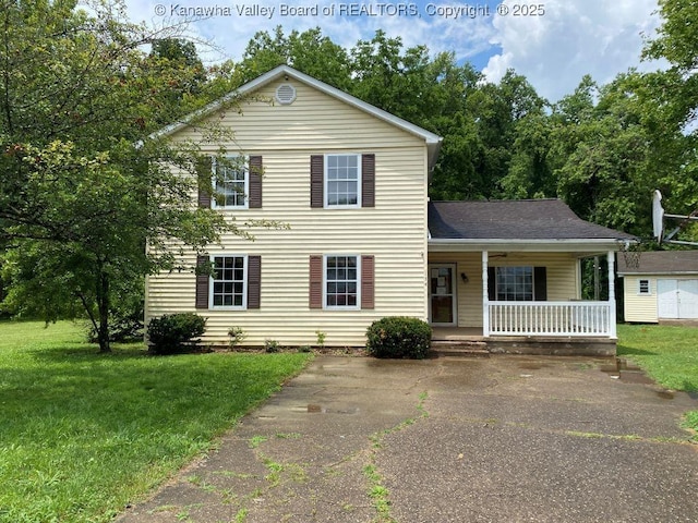 134 Ferguson Ct, Huntington, WV 25701 - view of front of home with a porch, a front yard, and a shingled roof