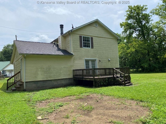134 Ferguson Ct, Huntington, WV 25701 - rear view of house featuring a wooden deck, a lawn, and a shingled roof