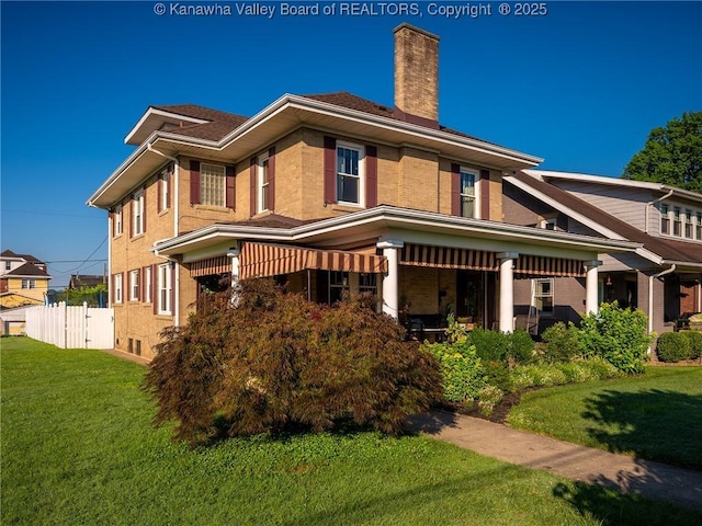 2961 Staunton Rd, Huntington, WV 25702 - back of property with a chimney, brick siding, and covered porch