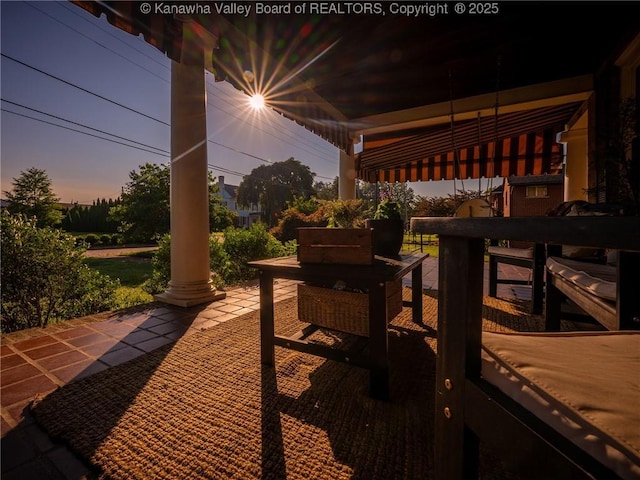 2961 Staunton Rd, Huntington, WV 25702 - patio terrace at dusk with a wooden deck