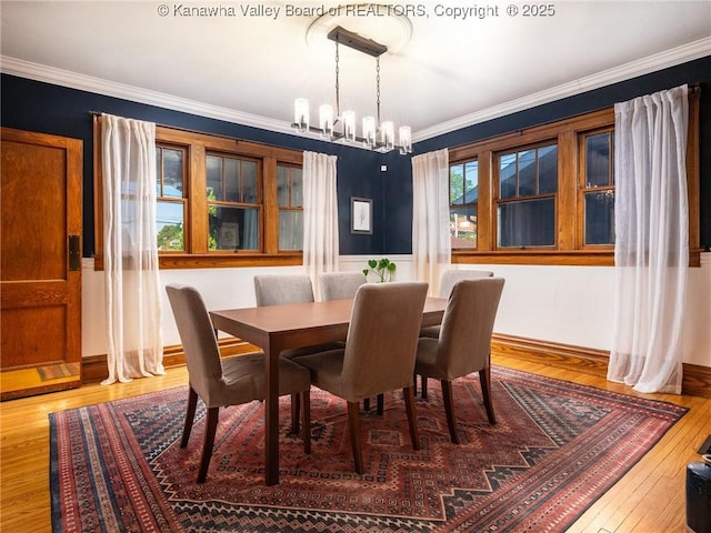 2961 Staunton Rd, Huntington, WV 25702 - dining space with hardwood / wood-style floors, a chandelier, and ornamental molding