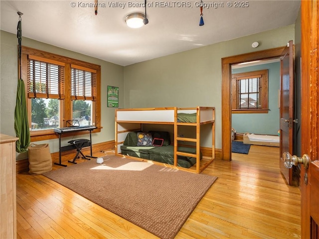 2961 Staunton Rd, Huntington, WV 25702 - bedroom featuring hardwood / wood-style floors and baseboards