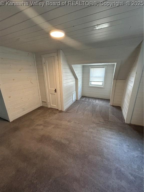 2010 Preston St, Charleston, WV 25302 - bonus room with dark colored carpet and wooden walls