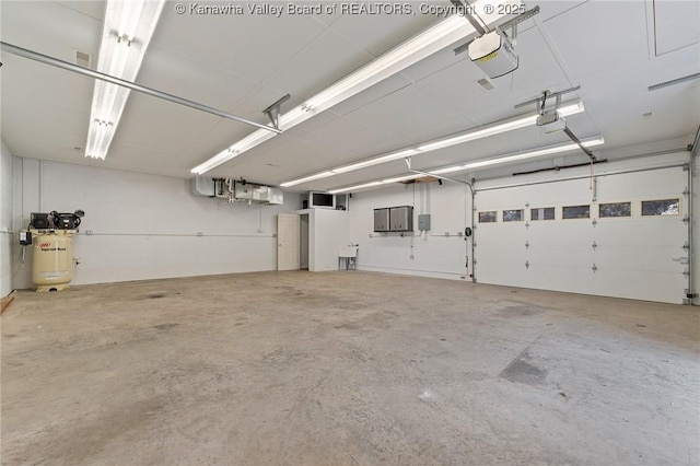 33 Shawnee Oaks Dr, Huntington, WV 25705 - garage with a garage door opener