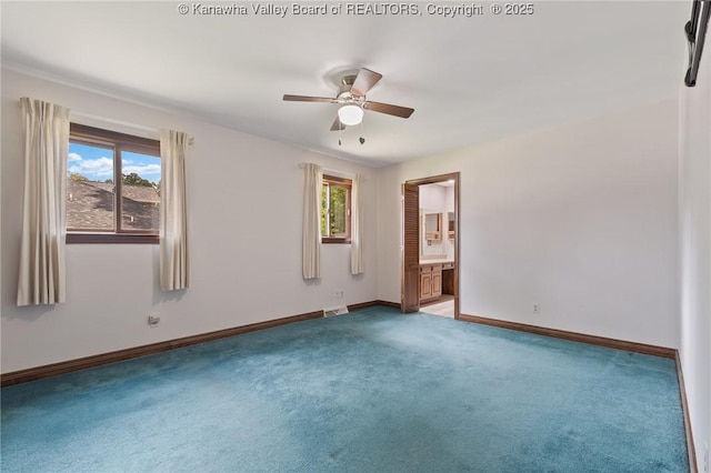 33 Shawnee Oaks Dr, Huntington, WV 25705 - empty room with carpet and a ceiling fan