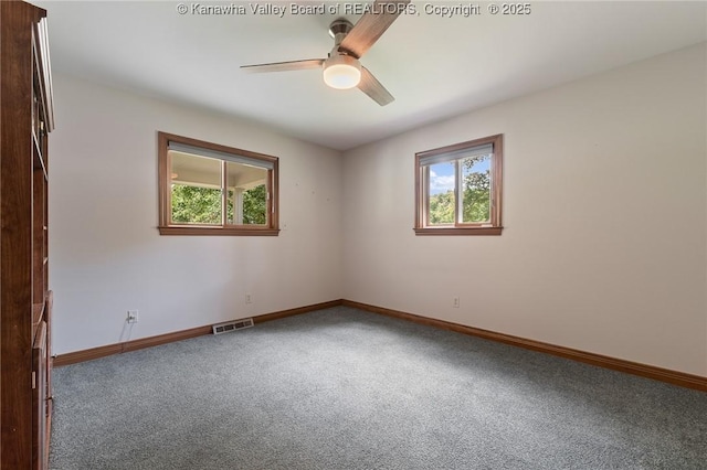 33 Shawnee Oaks Dr, Huntington, WV 25705 - unfurnished room with carpet flooring and a ceiling fan