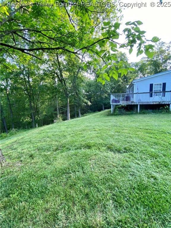 2399 Spicewood Rd, Kenna, WV 25248 - view of grassy yard with a deck